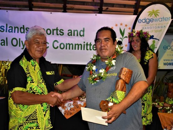 Thomas accepting award