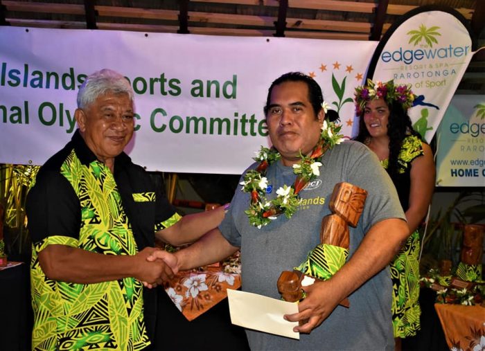 Thomas accepting award